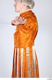  Photos Man in Historical Servant suit 2 Medieval clothing Medieval servant orange jacket upper body 0004.jpg